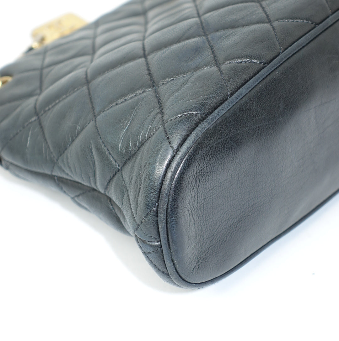 Chanel Quilted Dome Shoulder Bag
