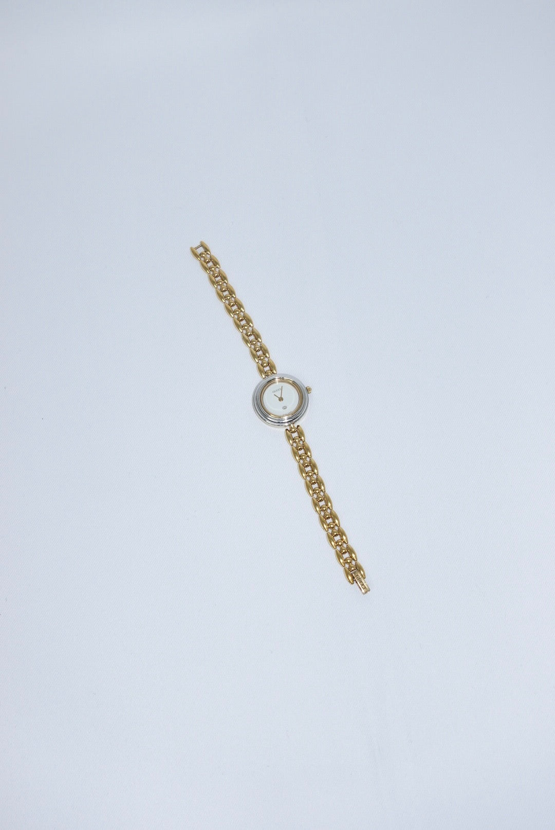 102. Gucci Bezel Gold Vintage Watch