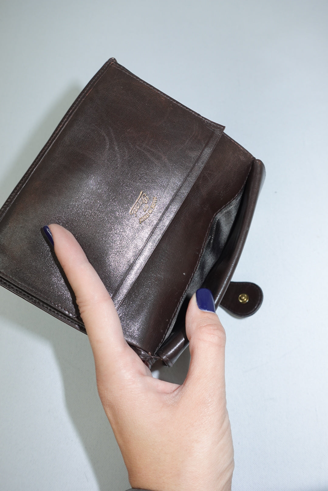 Portafoglio Gucci Vintage Medium in marrone cioccolato con logo GG color oro