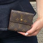 Vintage Louis Vuitton Monogram compact wallet in coated canvas