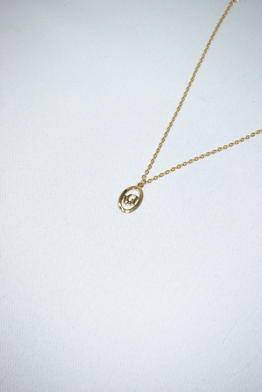 Christian Dior Gold Toned Vintage Necklace Round Logo