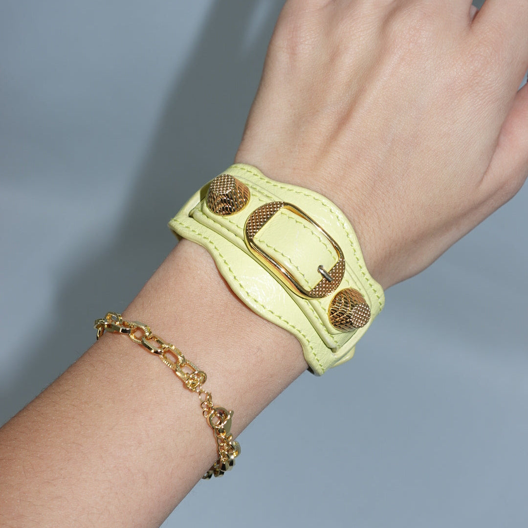Designer Balenciaga yellow leather bracelet with gold hardware details