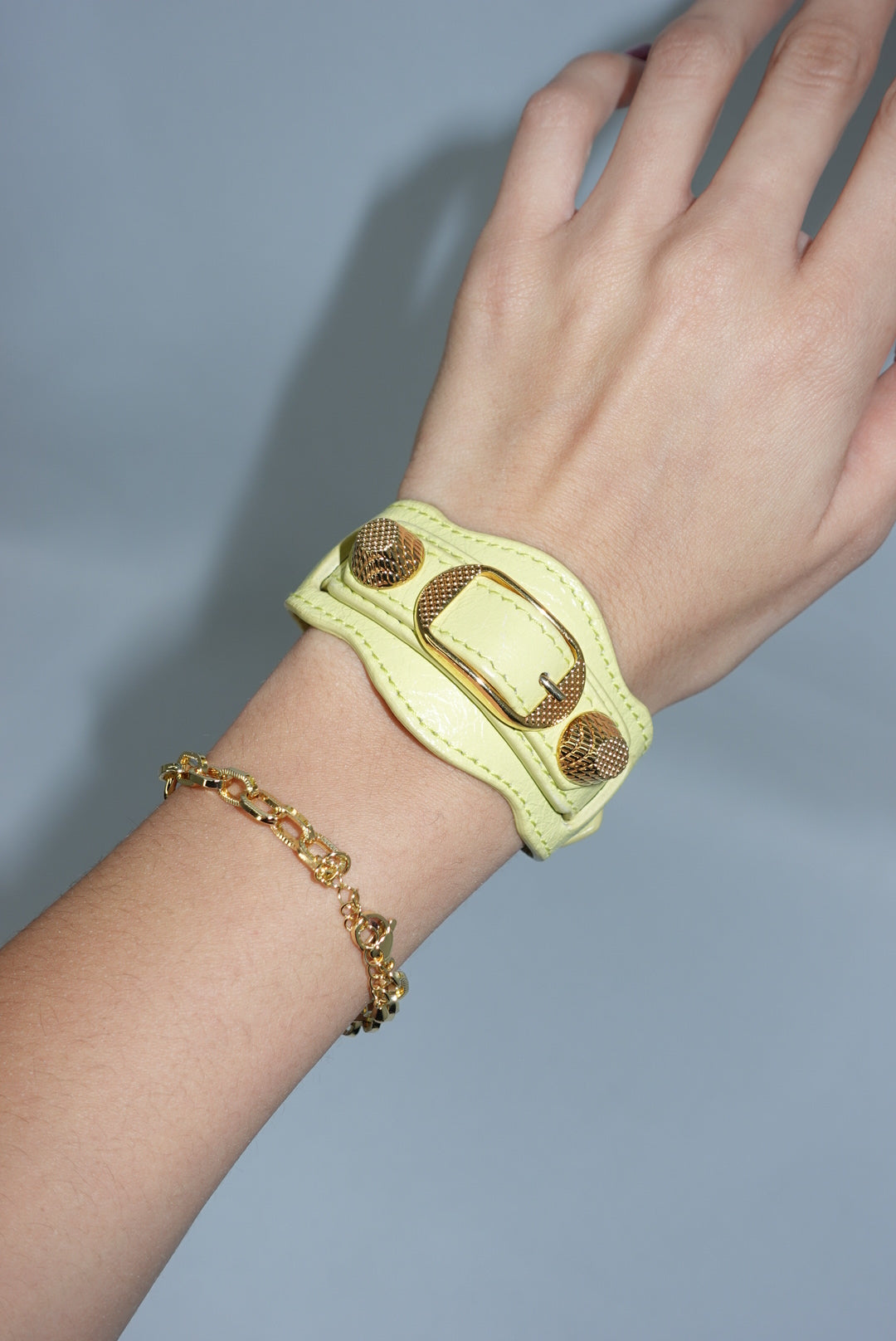 Designer Balenciaga yellow leather bracelet with gold hardware details