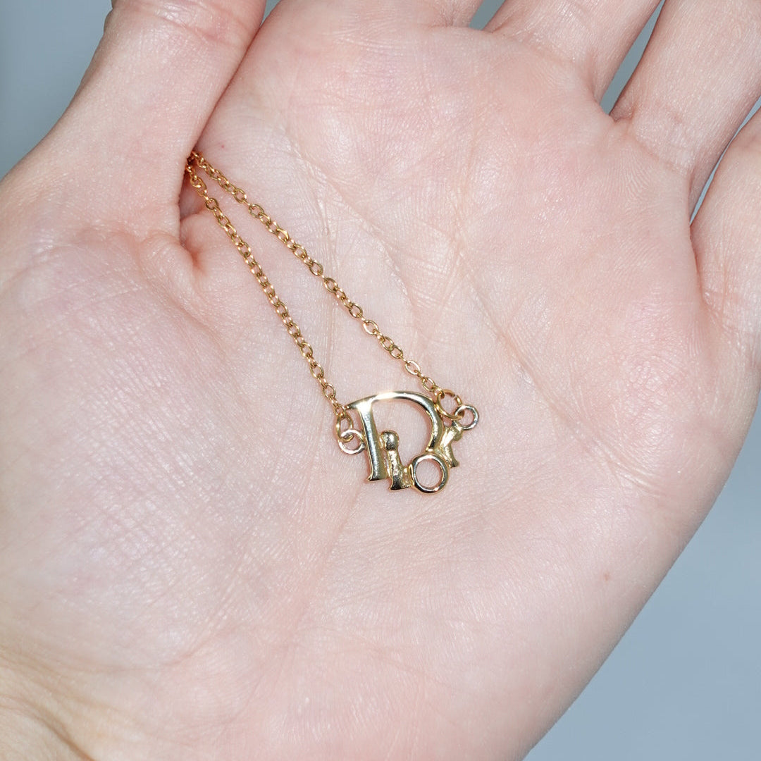 Authentic Dior vintage pendant reworked into modern necklace design