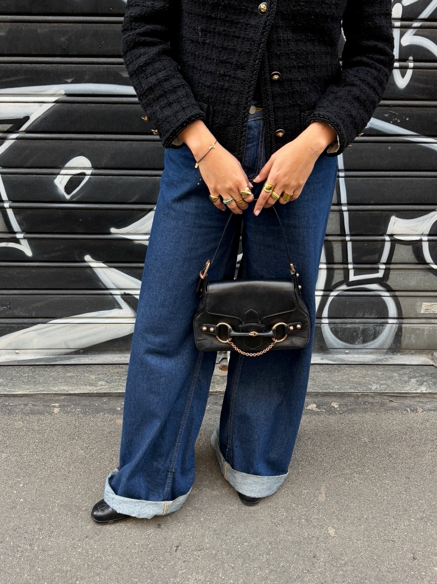 Gucci vintage black leather shoulder bag with signature Horsebit hardware