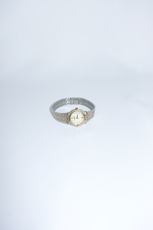 100. Gucci Vintage Silver Toned 9000L Quartz Ivory Dial Vintage Watch