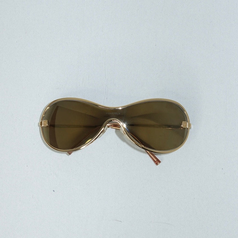 Occhiali da sole dorati Chanel