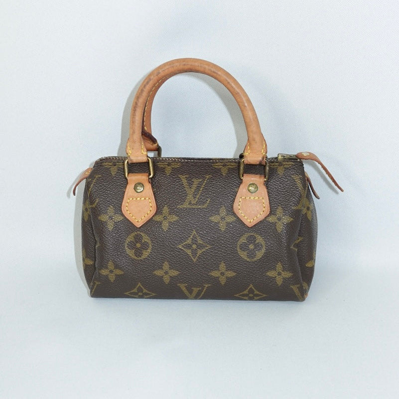 Louis Vuitton Nano Speedy Mini Bag in Monogram Canvas & Leather