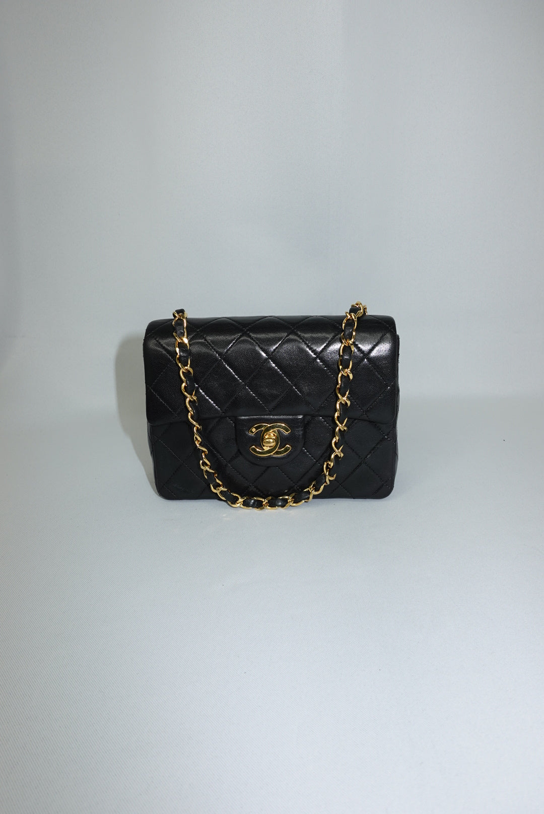 chanel black mini flap vintage luxury