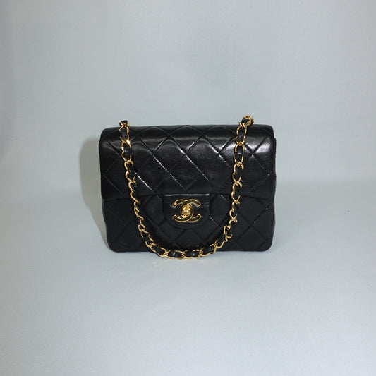 chanel black mini flap vintage luxury