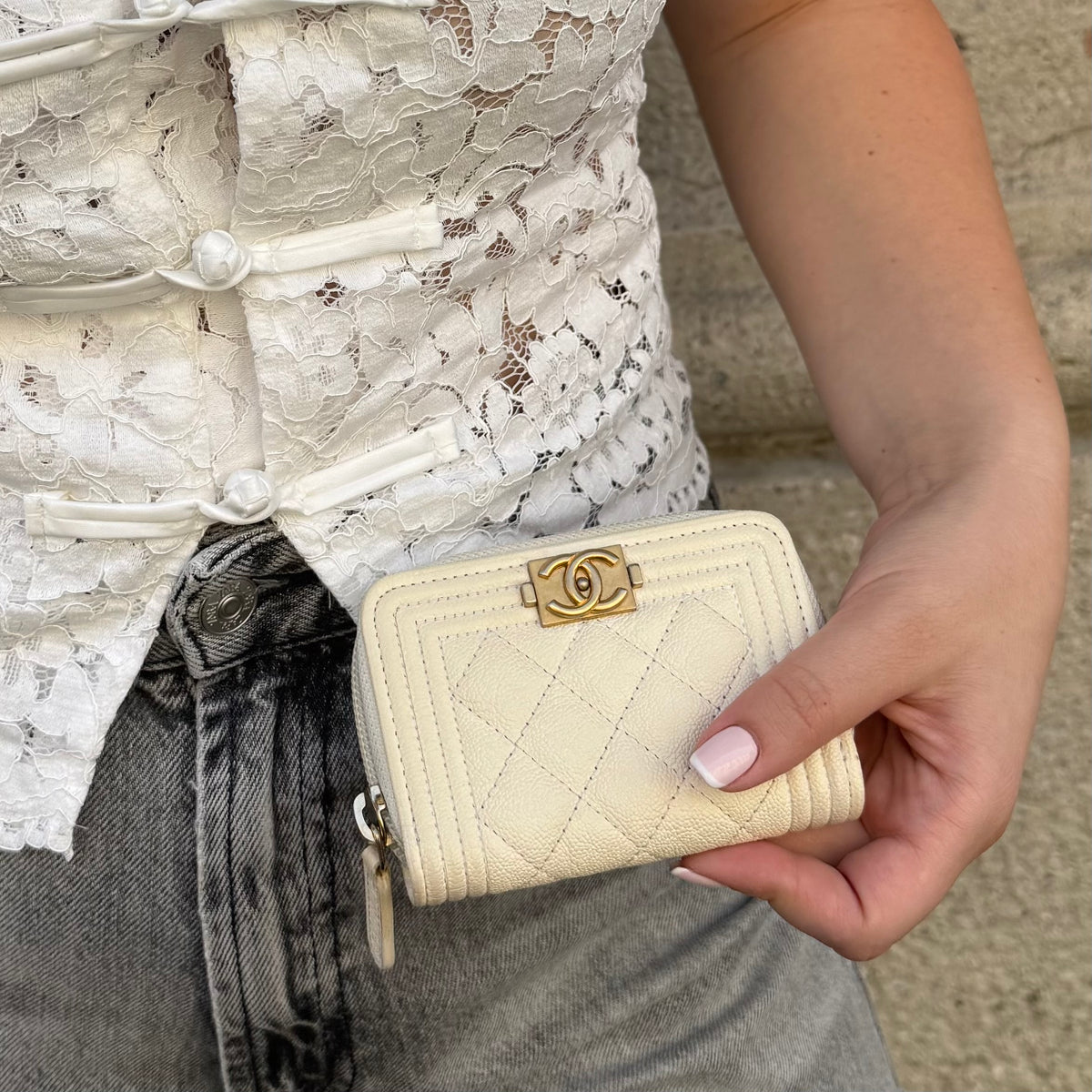Cream Chanel compact wallet from the Boy collection