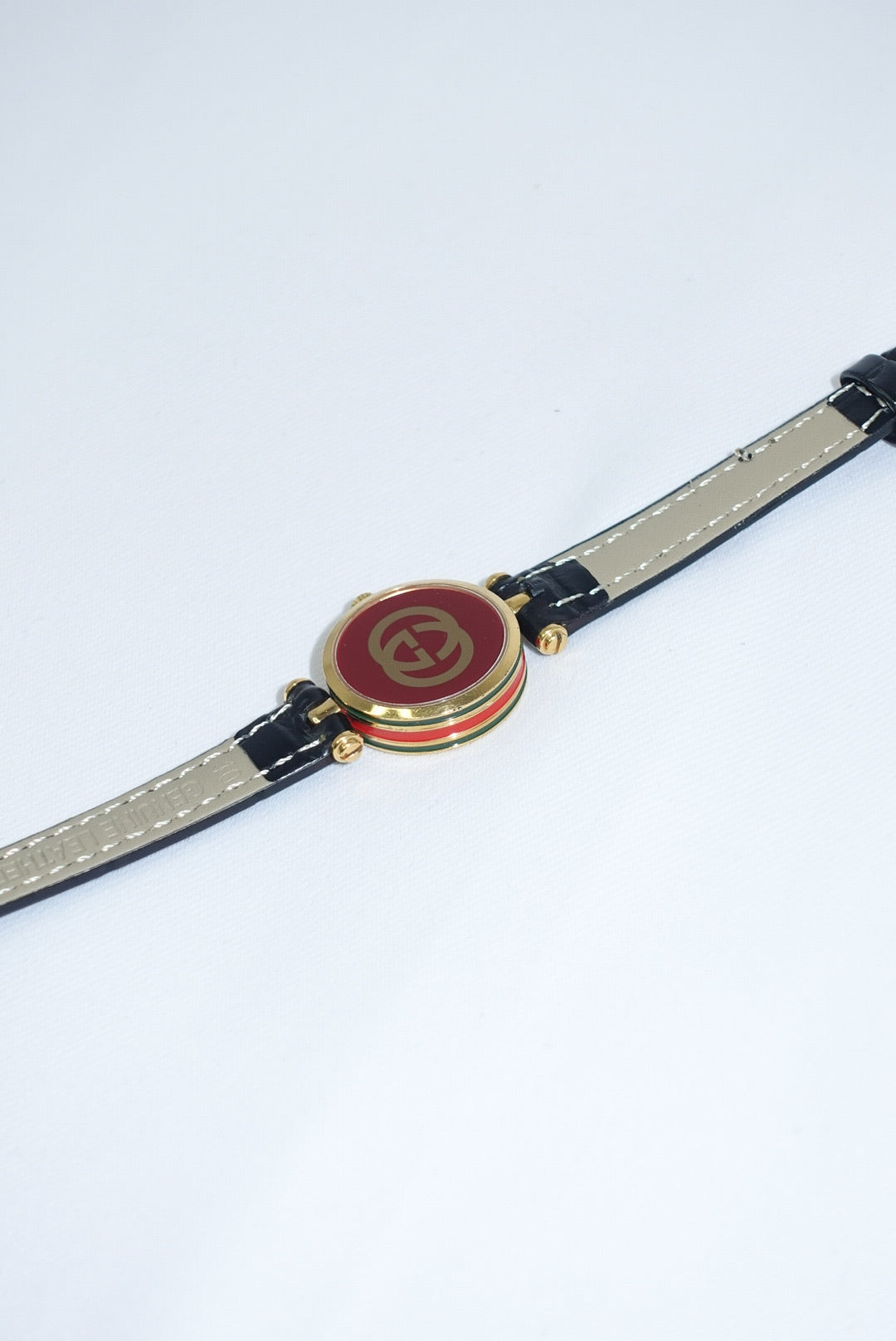 104. Gucci Vintage Black Leather Strap Gold Shelly Line Watch