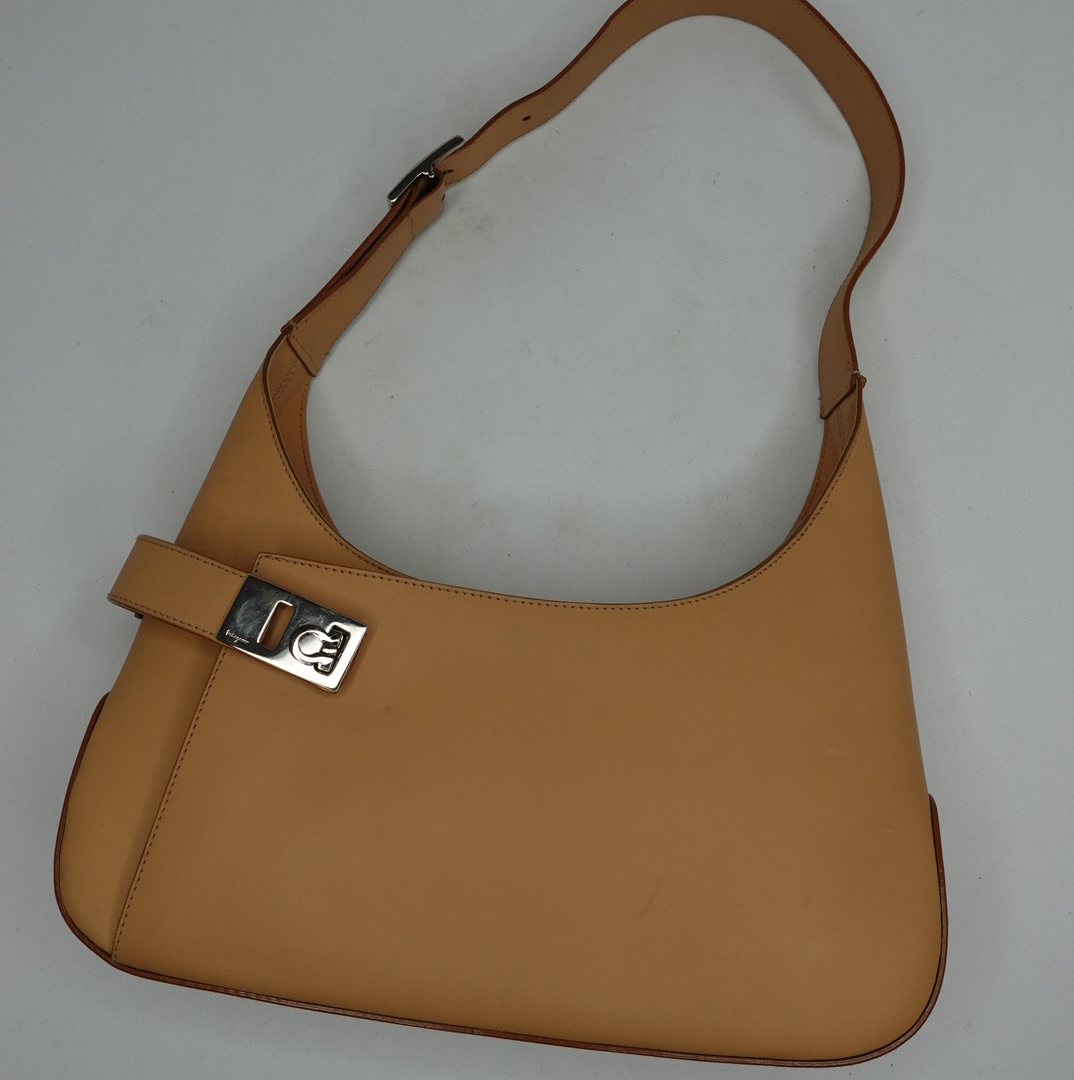 Vintage Salvatore Ferragamo tan leather hobo bag with silver-toned front hardware