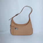 Ferragamo Gancini beige hobo bag with signature Gancini hardware and spacious curved design