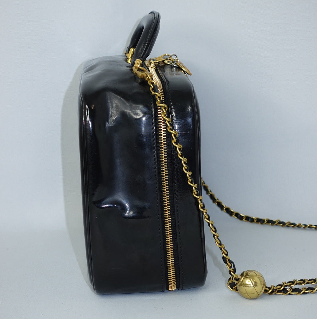 chanel black patent leather vanity bag side
