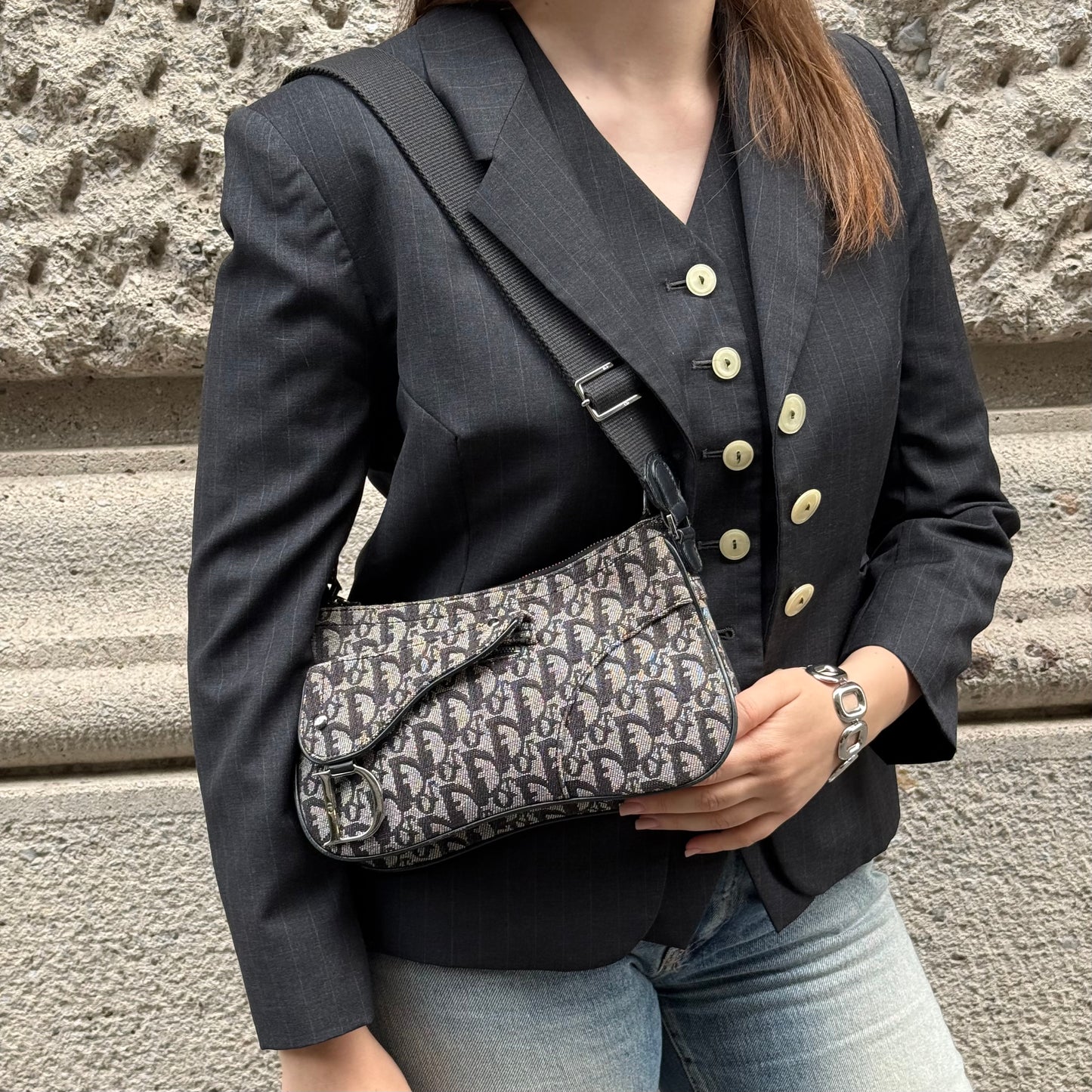  Vintage Dior Double Saddle Monogram Canvas Crossbody Bag worn crossbody showcasing its elegant fit and timeless design.