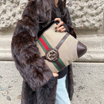 Gucci vintage beige Reins Hobo Bag in GG canvas with brown leather trim and signature hardware, front view
