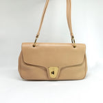 Gucci Lady Lock beige leather bag with signature lock closure, front view