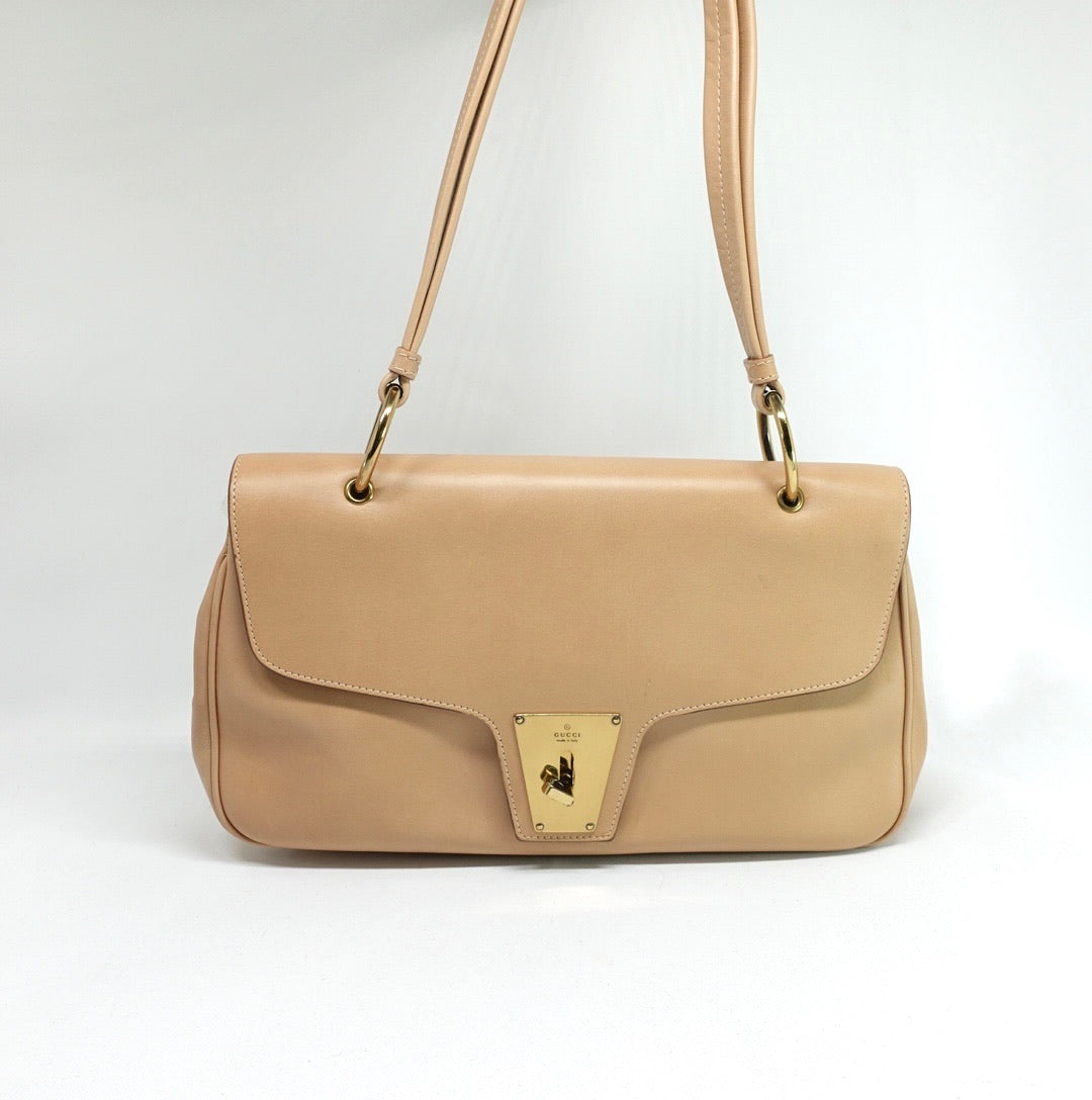 Gucci Lady Lock beige leather bag with signature lock closure, front view