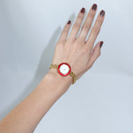 Gucci gold-toned bezel watch with white dial and extra bezels