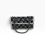 My Vintage Attire Chanel chessboard flap bag in black patent leather and tweed with silver CC turn-lock hardware.