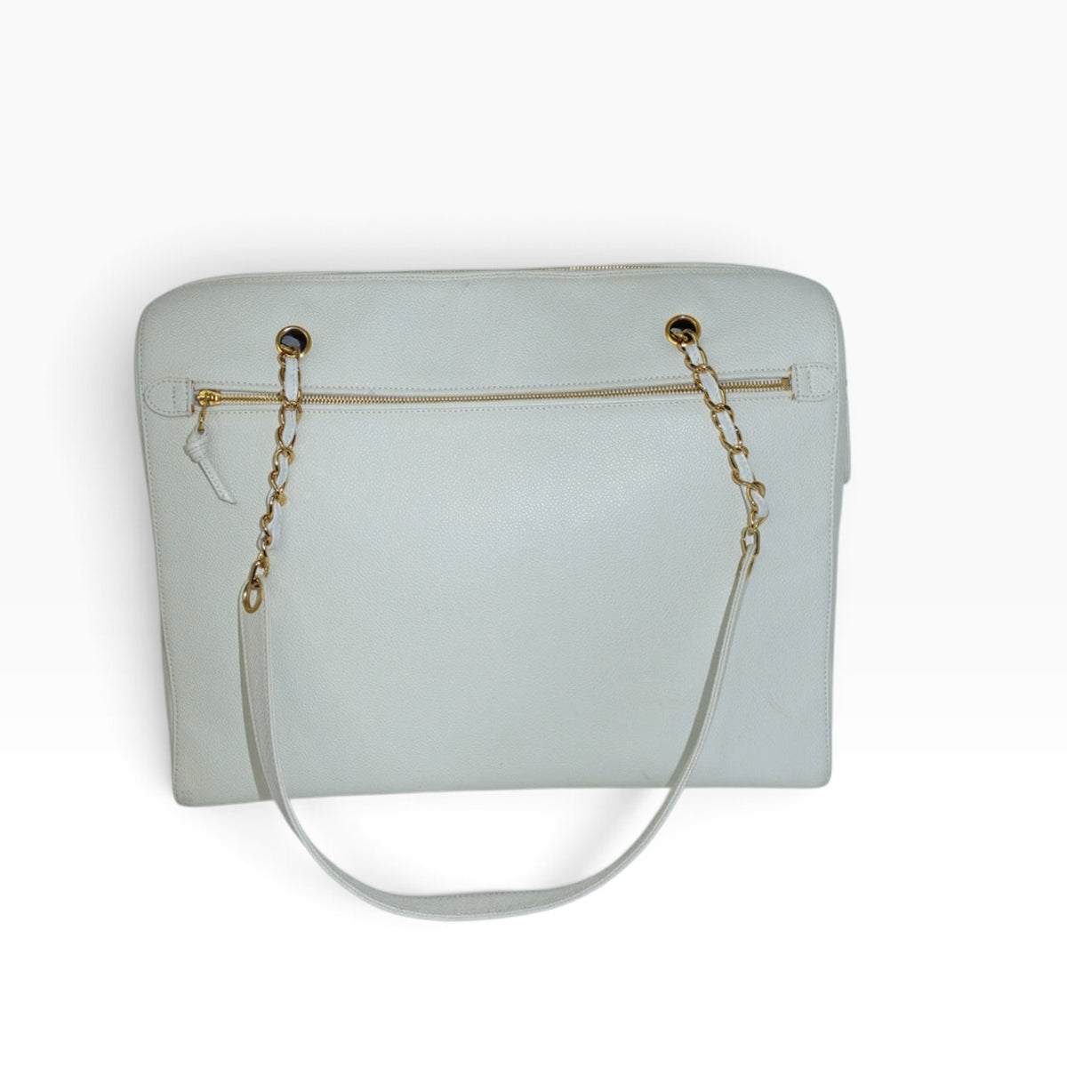 My Vintage Attire Chanel white caviar leather maxi tote bag with gold chain straps and rear zip pocket.