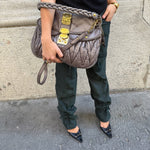 My Vintage Attire Miu Miu grey matelassé lambskin Coffer shoulder bag with gold hardware and braided handle.