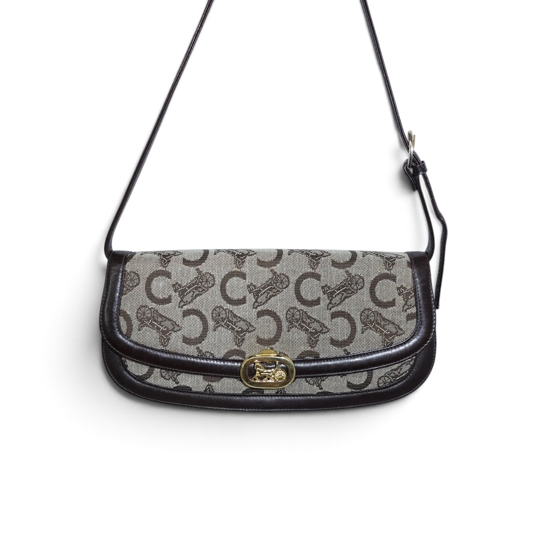 My Vintage Attire Celine Sulky shoulder bag in brown and beige monogram canvas with dark leather trim and gold hardware.