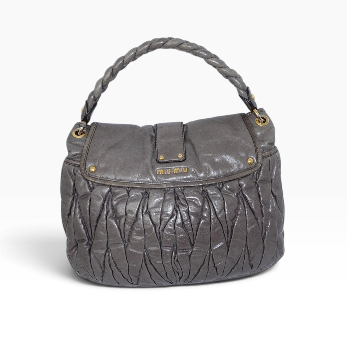 My Vintage Attire Miu Miu grey matelassé lambskin Coffer shoulder bag with gold-tone hardware and braided handle.
