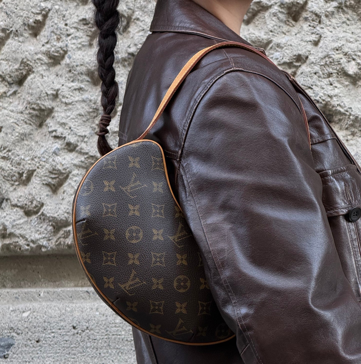 Louis Vuitton Croissant PM monogram canvas bag worn on shoulder