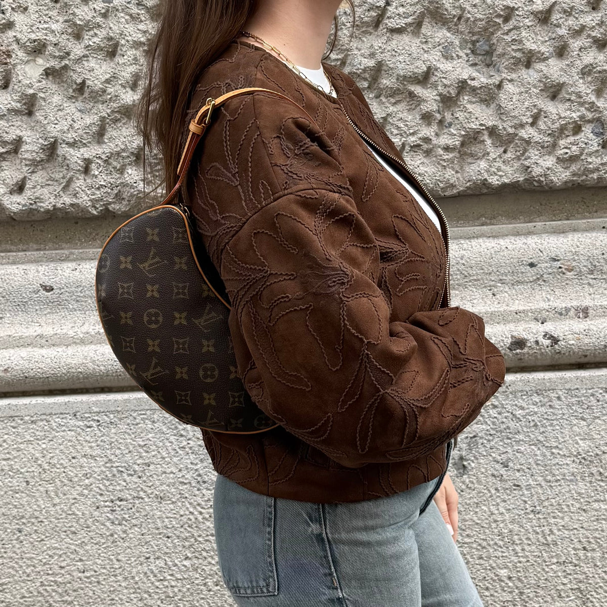 Louis Vuitton Croissant PM monogram canvas worn side
