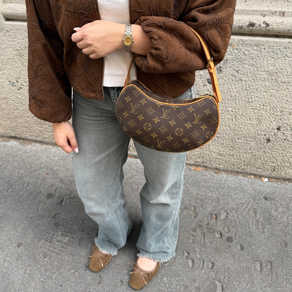 Louis Vuitton Croissant PM monogram canvas front worn
