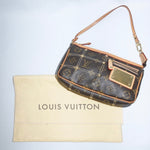 Vintage Louis Vuitton Limited Edition Monogram Pochette with leather details and gold-toned hardware