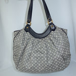 Louis Vuitton MM Idylle Hobo Bag back view featuring signature monogram canvas