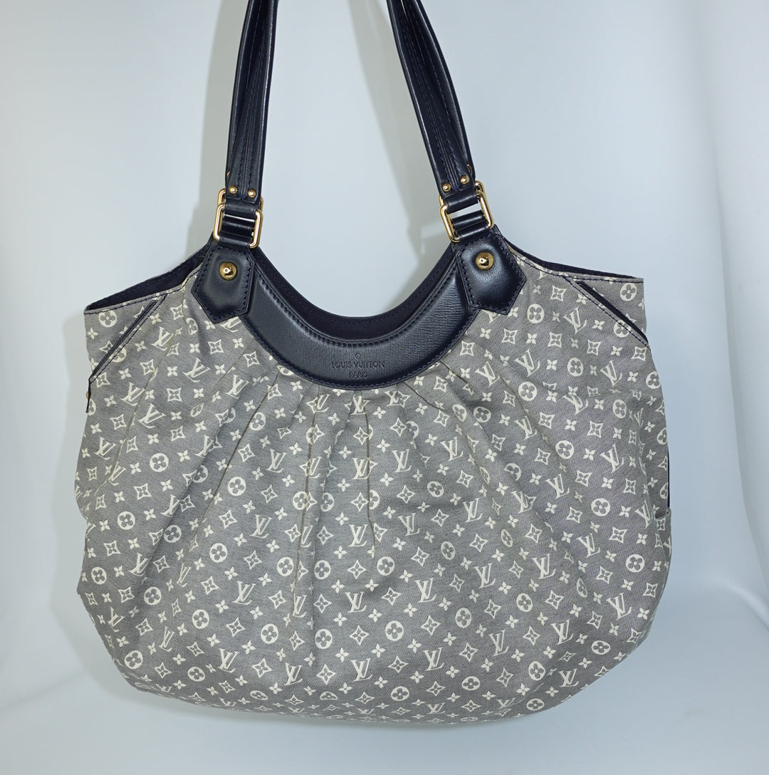 Louis Vuitton MM Idylle Hobo Bag front view featuring signature monogram canvas