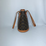 Louis Vuitton Monogram Bucket Bag side profile with Vachetta leather details
