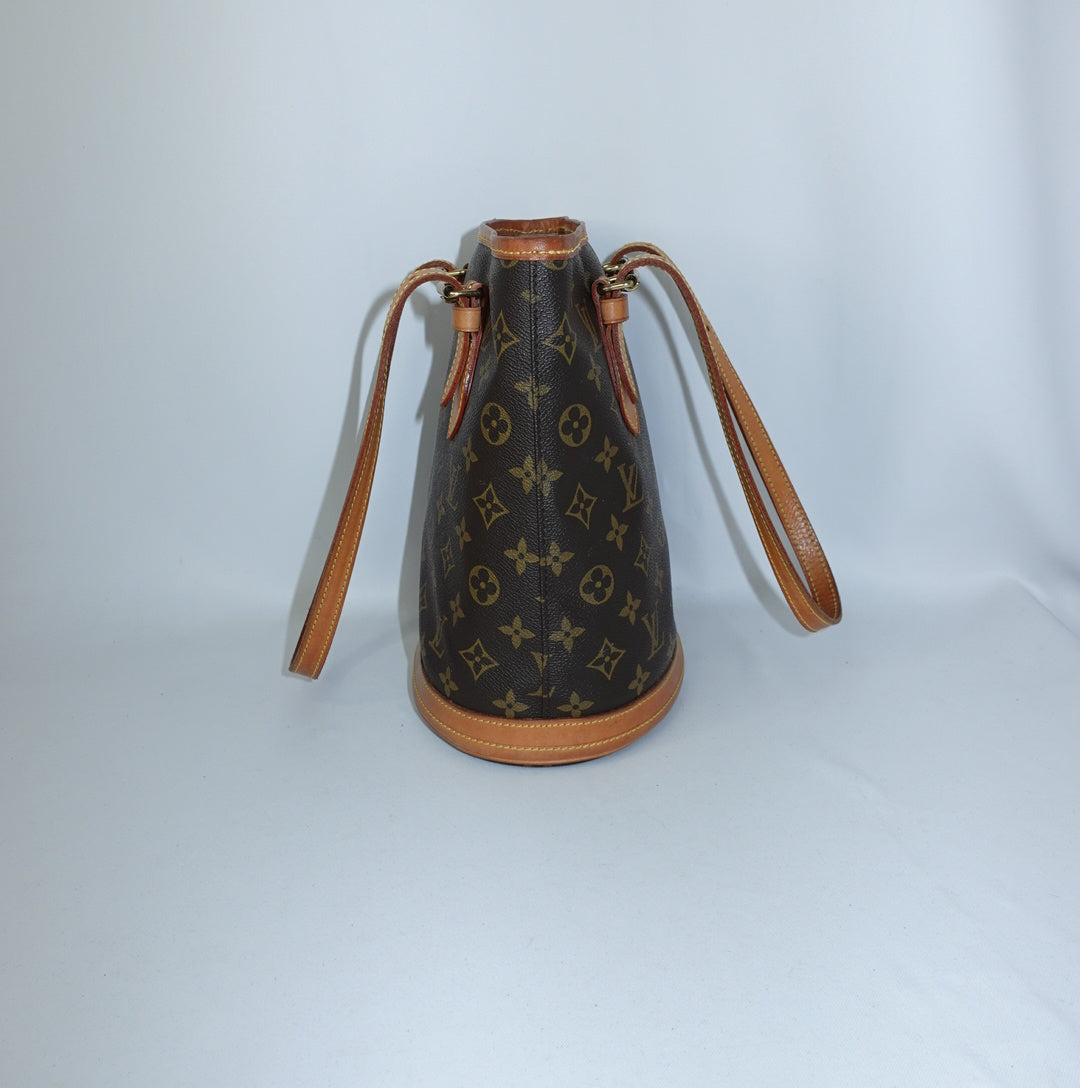 Louis Vuitton Monogram Bucket Bag side profile with Vachetta leather details
