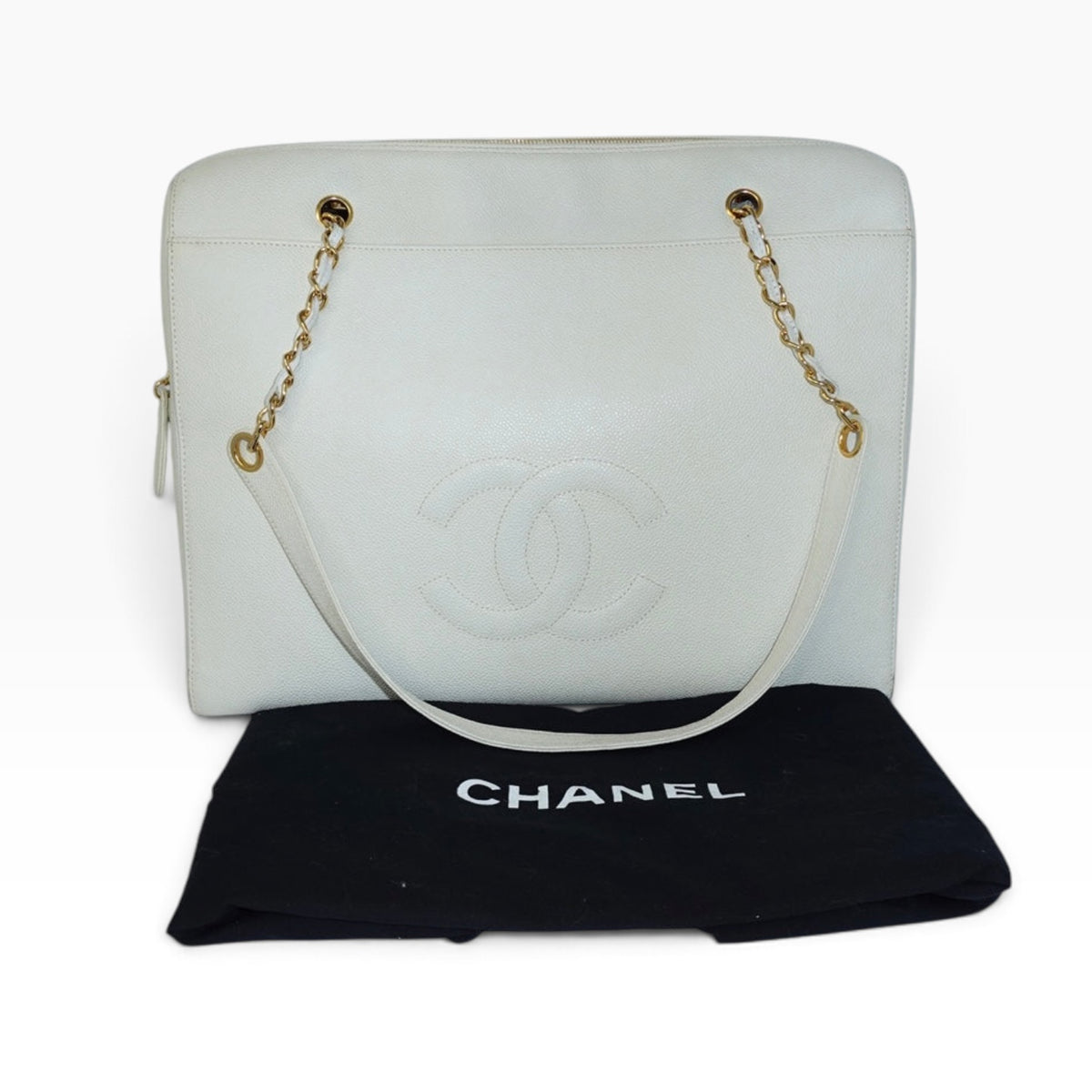 My Vintage Attire Chanel white caviar leather maxi tote bag with embossed CC logo and gold chain straps.