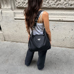     Prada Nylon Hobo Long Strap Bag worn front view showing size and fit