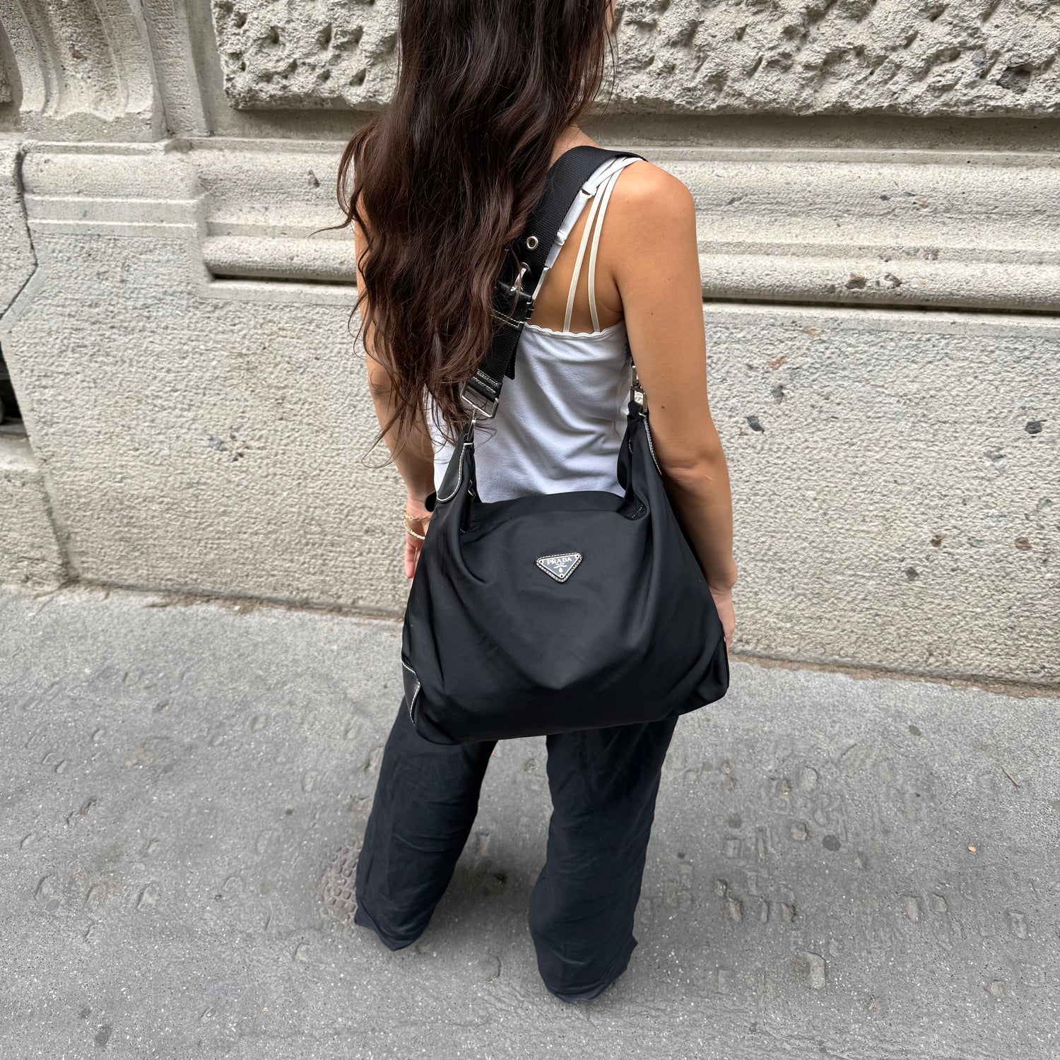     Prada Nylon Hobo Long Strap Bag worn front view showing size and fit