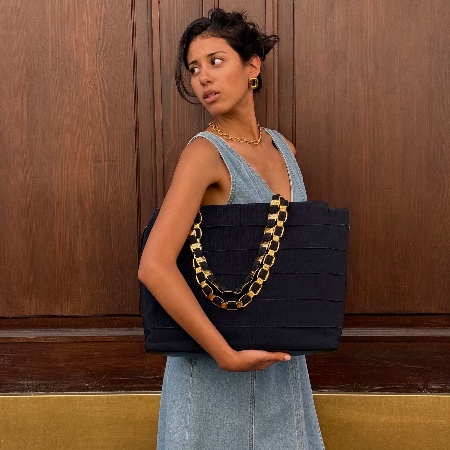 Salvatore Ferragamo Navy Ruffle Tote Bag worn front view close up showing ruffle details